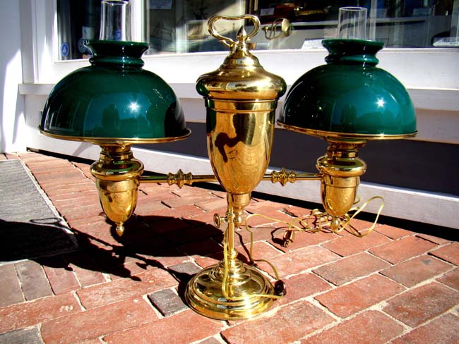 A late 19th century double oil lamp made by Duplex & Co., now converted to electricity